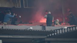 altText(Detuvieron al hincha de Nacional que habría tirado la bengala que hirió al policía en el clásico pasado)}