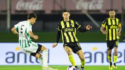 altText(Peñarol y Racing empataron 1 a 1 en su regreso a la actividad local)}