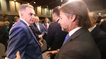 El presidente Orsi y Lacalle Pou.