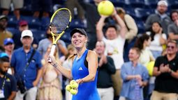 altText(Caroline Wozniacki volvió al US Open con una sonrisa)}